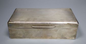 A George V silver mounted rectangular cigarette box, 16.3cm, gross 14oz.