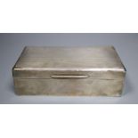 A George V silver mounted rectangular cigarette box, 16.3cm, gross 14oz.