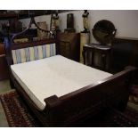 A William IV mahogany Gothic design bedstead, width 140cm