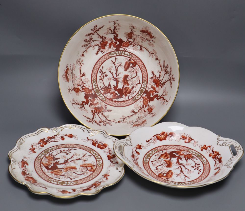 A Coalport "Indian Tree Coral" bowl and two matching dessert dishes in iron-red and gilt, bowl 26cm