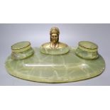 A green onyx desk stand, surmounted with a bust of Dante, 45cm