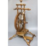 An oak and beech spinning wheel, height 63cm