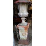 A Victorian terracotta campana garden urn on pedestal, urn 60cm diameter, total height 166cm