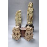 A pair of large Chinese soapstone figures of immortals, tallest 43cm and a pair of similar