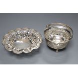 A Chinese pierced white metal 'flowerhead' bowl, diameter 12.2cm, maker 'MT' and a similar small