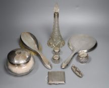 A silver-mounted conical glass scent bottle, sundry other silver-mounted toilet items and an