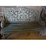 A Coalbrookdale style nasturtium pattern painted cast metal garden bench, width 132cm
