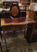 A late Victorian satinwood banded mahogany bowfront writing table, width 76cm, depth 45cm, height