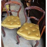 A set of six mid Victorian rosewood balloon back dining chairs with buttoned gold dralon seats