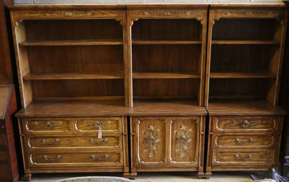 Three American stencilled walnut cabinets, total width 270cm, depth 44cm, height 181cm