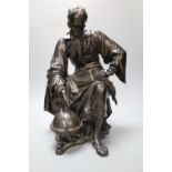 Jean Gout. A bronze model of a scholar painting to a globe, height 34cm