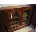 A Victorian mahogany bookcase, width 107cm, depth 25cm, height 92cm