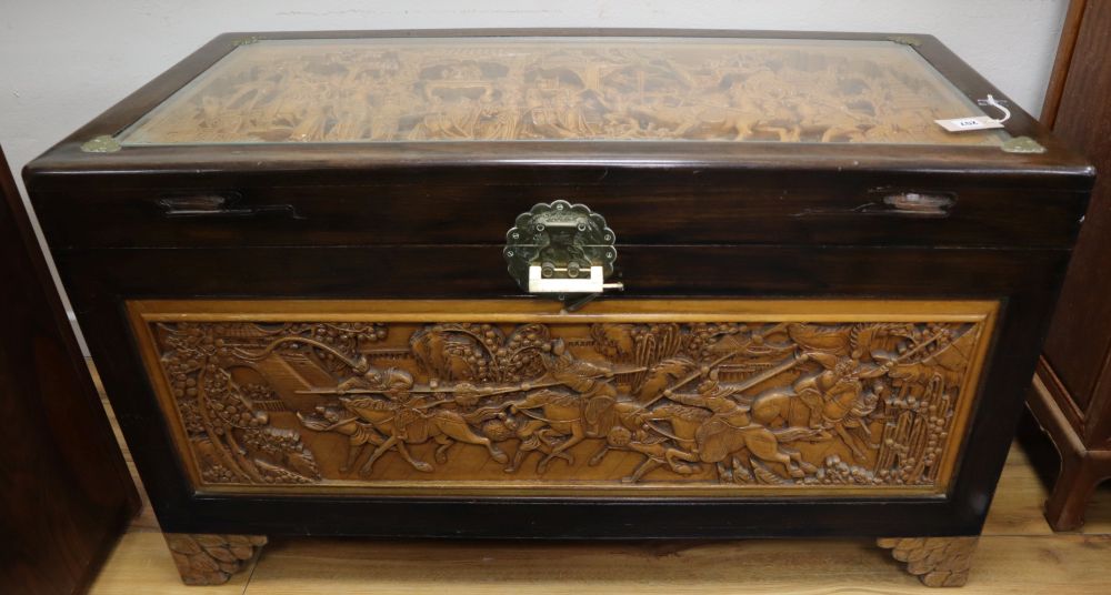 A Chinese carved camphor lined chest, width 110cm, depth 54cm, height 63cm