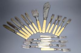 A pair of Edwardian silver ivory handled fish servers by Mappin & Webb, six pairs of late