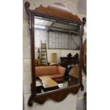 A George III style fret frame wall mirror, 49 x 73cm