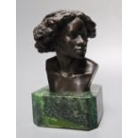 After F Masseau. A bronze bust, on green marble base