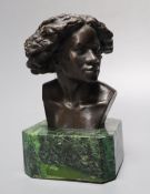 After F Masseau. A bronze bust, on green marble base