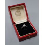 A modern Cartier platinum and Princess cut solitaire diamond ring, size M, gross 4.8 grams, the