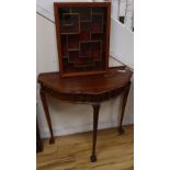 A Chinese hardwood demi-lune table together with a hanging cabinet, width 42cm, depth 9cm, height