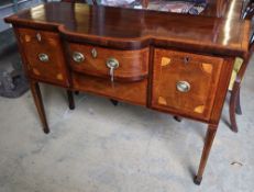 A George III satinwood banded and inlaid mahogany bowfront sideboard, width 129cm depth 53cm
