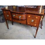 A George III satinwood banded and inlaid mahogany bowfront sideboard, width 129cm depth 53cm