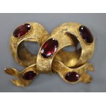 A Victorian yellow metal and five stone oval garnet set scroll mourning brooch, 49mm, gross 11.8