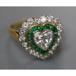 A modern 18ct gold, heart shaped diamond and emerald cluster set heart shaped dress ring, size N,