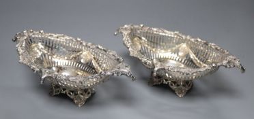 A pair Victorian pierced and cast silver oval bon bon dishes, London 1895, maker Thomas Bradbury,