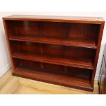 A Chinese hardwood open bookcase, width 122cm, depth 25cm, height 91cm