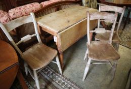 A Victorian pine Pembroke table, width 98cm and three Victorian Windsor chairs