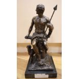 After Isidore Jules Bonheur. A bronze model of a male seated with a dog, height 47cm