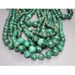 Ten assorted single strand malachite bead necklaces, two with gilt metal spacers, largest approx.