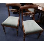 A set of eight William IV rosewood dining chairs