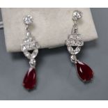 A pair of modern Art Deco style white metal (stamped 14k), ruby and diamond set drop screw back