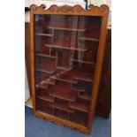 A Chinese glazed hardwood hanging cabinet, width 50cm, depth 11cm, height 88cm