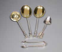 A pair of George V silver 'seal top' serving spoons by Mappin & Webb, a silver sifter spoon, pair of