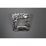 A George Jensen sterling 'Recumbent deer and squirrel' square brooch, design no. 318, 37mm, 16.1