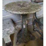 A Victorian cast iron garden table with marble top, 58cm diameter, height 76cm