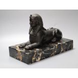 A bronzed spelter and marble sphinx, on marble plinth, height 32cm