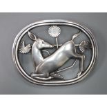 A Georg Jensen sterling 'kneeling deer' oval brooch, no. 256, 42mm, 12.2 grams.CONDITION: Overall