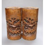 A pair of Chinese carved bamboo brush pots, height 22cm