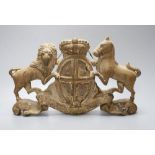 An 18th century carved limewood Royal coat of arms, width 30cm