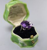 A white metal (stamped 18ct) and fancy hexagonal cut solitaire amethyst dress ring, size K, gross