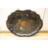A Victorian papier mache painted tray by Jennens & Bettridge, width 79cmCONDITION: Wave-edge rim has