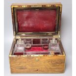 A Regency brass mounted rosewood toilet box, with glass contents and base drawer, width 36cm