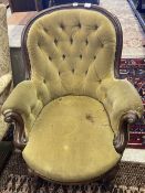 A Victorian mahogany framed button spoonback armchair