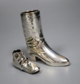 A silver novelty 'boot' pin cushion, Levi & Salaman, Birmingham 1909 (lacking cushion),55m and a