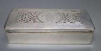 A continental white metal mounted rectangular cigarette box, with pierced engraved lid, 18.6cm,