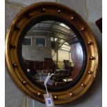 A Regency style convex wall mirror, 42cm diameter