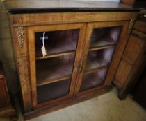 A late Victorian figured walnut gilt metal mounted pier cabinet, width 96cm, depth 32cm, height